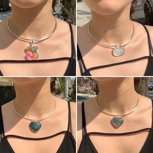 Silver round necklace with 4 cristal charms